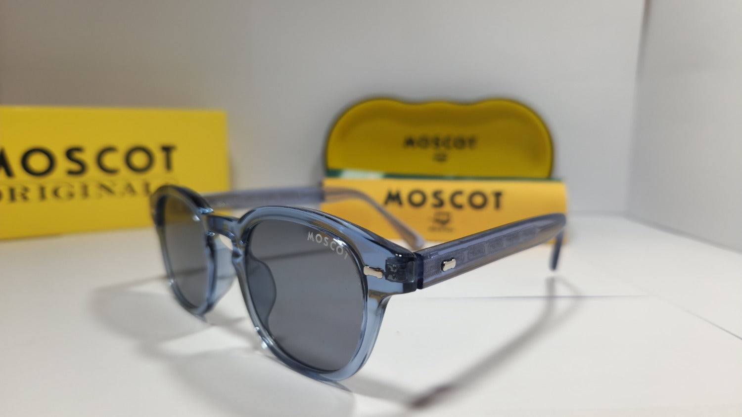🕶️ MOSCOT Classic Sunglasses – Transparent Blue Edition