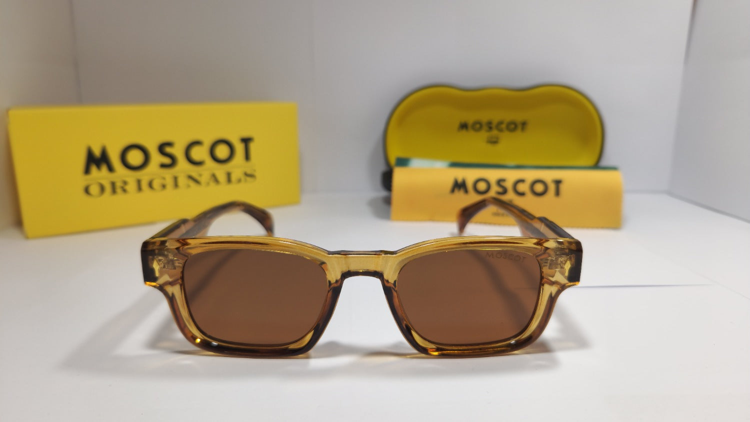 🕶️ MOSCOT Amber Sunglasses – Honey Brown Edition