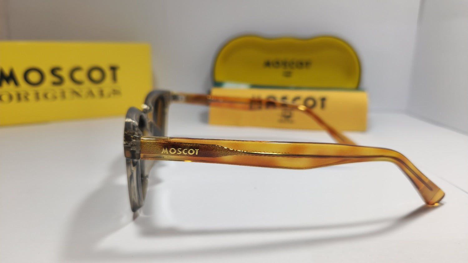 🕶️ MOSCOT Classic Sunglasses – Amber Crystal Edition
